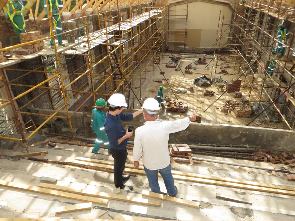 Construction specialists collaborating with clients on a project